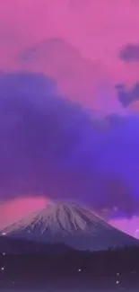 Mountain silhouette against pink and purple sky wallpaper