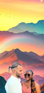 Vibrant mountain wallpaper with sunset and rainbow.