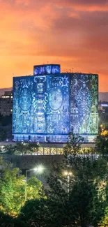 Vibrant city mural illuminated at sunset with colorful urban skyline.