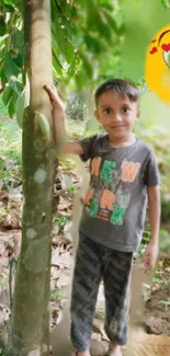 Child in nature with a playful, colorful emoji background.