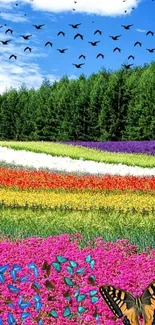 Vibrant landscape with flowers, butterflies, and birds under a blue sky.