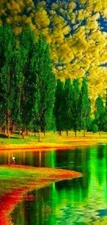 Green trees reflecting in water under a colorful sky.