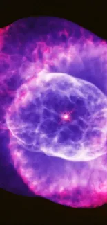 Purple and pink nebula space wallpaper for mobile devices.