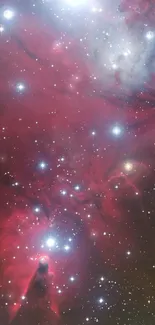 Vibrant deep red nebula space scene with stars and cosmic formations.