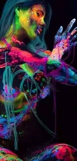 Colorful neon art with body paint under blacklight.