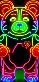 Vibrant neon bear design with glowing outlines on a black background.