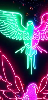 Vibrant neon birds with glowing wings on a dark background.