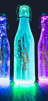 Three vibrant neon bottles glowing against darkness.