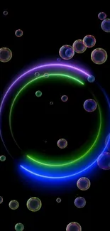 Neon bubbles with colorful glow on black background wallpaper.