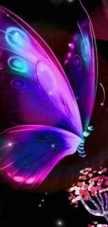 Vibrant neon butterfly with purple hues on a black background.