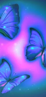 Three neon butterflies with glowing blue and purple hues.