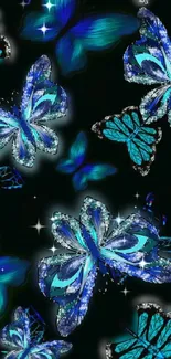 Vibrant neon blue butterflies on dark background wallpaper.