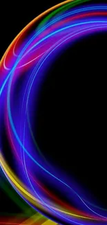 Vibrant neon circle on black background wallpaper