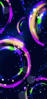 Vibrant neon circles on dark background wallpaper.