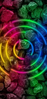 Vibrant neon circles glowing on colorful stones background.