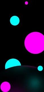 Neon circles with pink and cyan on black background.