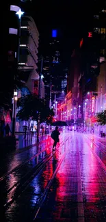 Silhouette under umbrella in neon-lit city street at night.