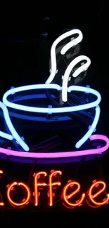 Vibrant neon artwork of a coffee cup with colorful lighting.