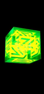 Glowing neon green cube on black background.