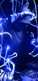 DJ with neon blue light effects creating an electric vibe.