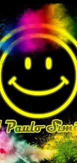 Colorful neon DJ smiley wallpaper with vibrant hues of yellow, pink, and green.