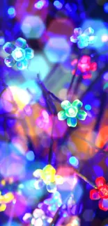 Vibrant neon flowers with glowing colors and artistic bokeh effect in a digital wallpaper.