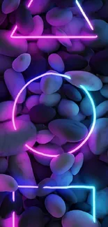 Vibrant neon geometric shapes on pebbles.