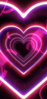 Vibrant neon heart design with glowing pink and purple hues for mobile wallpaper.