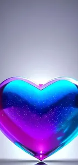 Vibrant heart-shaped design with blue and purple hues on a mobile wallpaper.