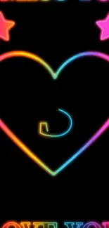 Neon heart with colorful glow and stars on a black background.