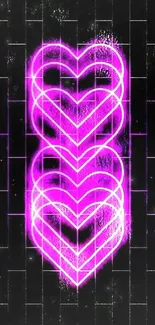 Glowing neon pink hearts on a dark grid background.