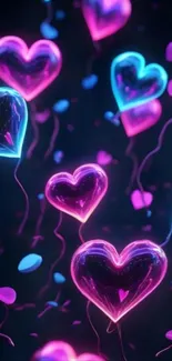 Neon hearts glowing in vibrant colors on a dark background.