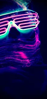 Vibrant neon light portrait of a person wearing glowing glasses.