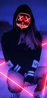 Person with a neon mask in an artistic pose under purple lighting.