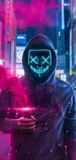 Hooded figure with a neon mask in a vibrant cityscape.