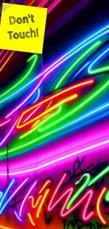 Vibrant neon graffiti wallpaper with 'Don't Touch!' note.