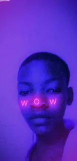 Portrait with neon purple lighting and 'WOW' text glowing on the nose.