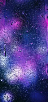 Vibrant neon raindrop wallpaper with purple and blue bokeh effect.