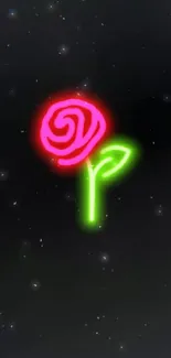 Bright neon rose with green leaves on a black background wallpaper.