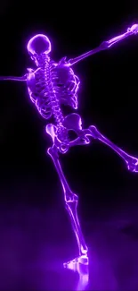 Neon skeleton dancing on a dark background.