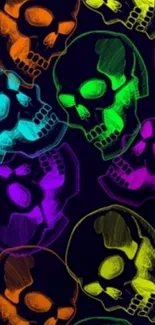 Vibrant neon skulls pattern on dark background.