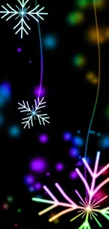 Vibrant neon snowflake mobile wallpaper with colorful glow on black background.