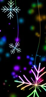 Vibrant neon snowflake wallpaper with colorful glowing designs on black background.