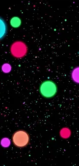 Vibrant neon dots on a black space background.