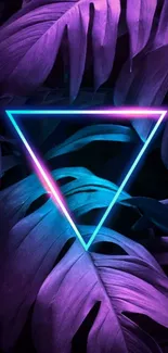 Neon triangle overlaid on lush purple tropical leaves.