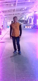 Man walks in neon-lit walkway with purple and sparkling effects.