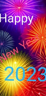 Vibrant fireworks display with Happy New Year 2023 text.