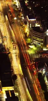 Dynamic cityscape with vibrant night lights and trails on urban streets.