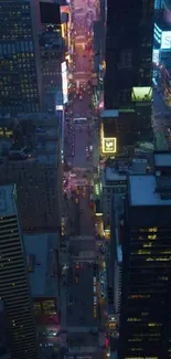 Aerial urban night scene with vibrant city lights and towering skyscrapers.