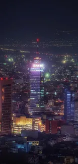 Night cityscape with vibrant lights and skyscrapers in a dark blue themed wallpaper.